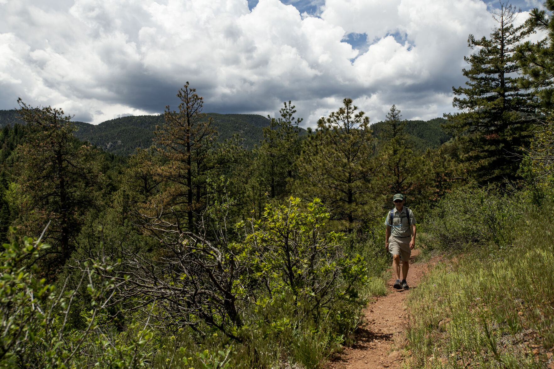 Dave Van Manen hikes the Mace Trail that overlooks Devil's Canyon at Pueblo Mountain Park located in Beulah, Colo., on Thursday, June 3, 2021. (Chancey Bush/ The Gazette) (Chancey Bush/ The Gazette)