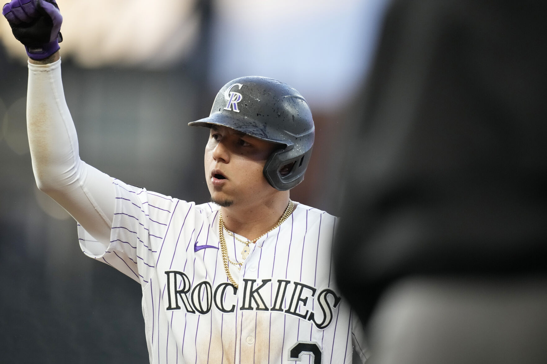 With one eye on the future, the Rockies win in extra innings on a wild pitch
