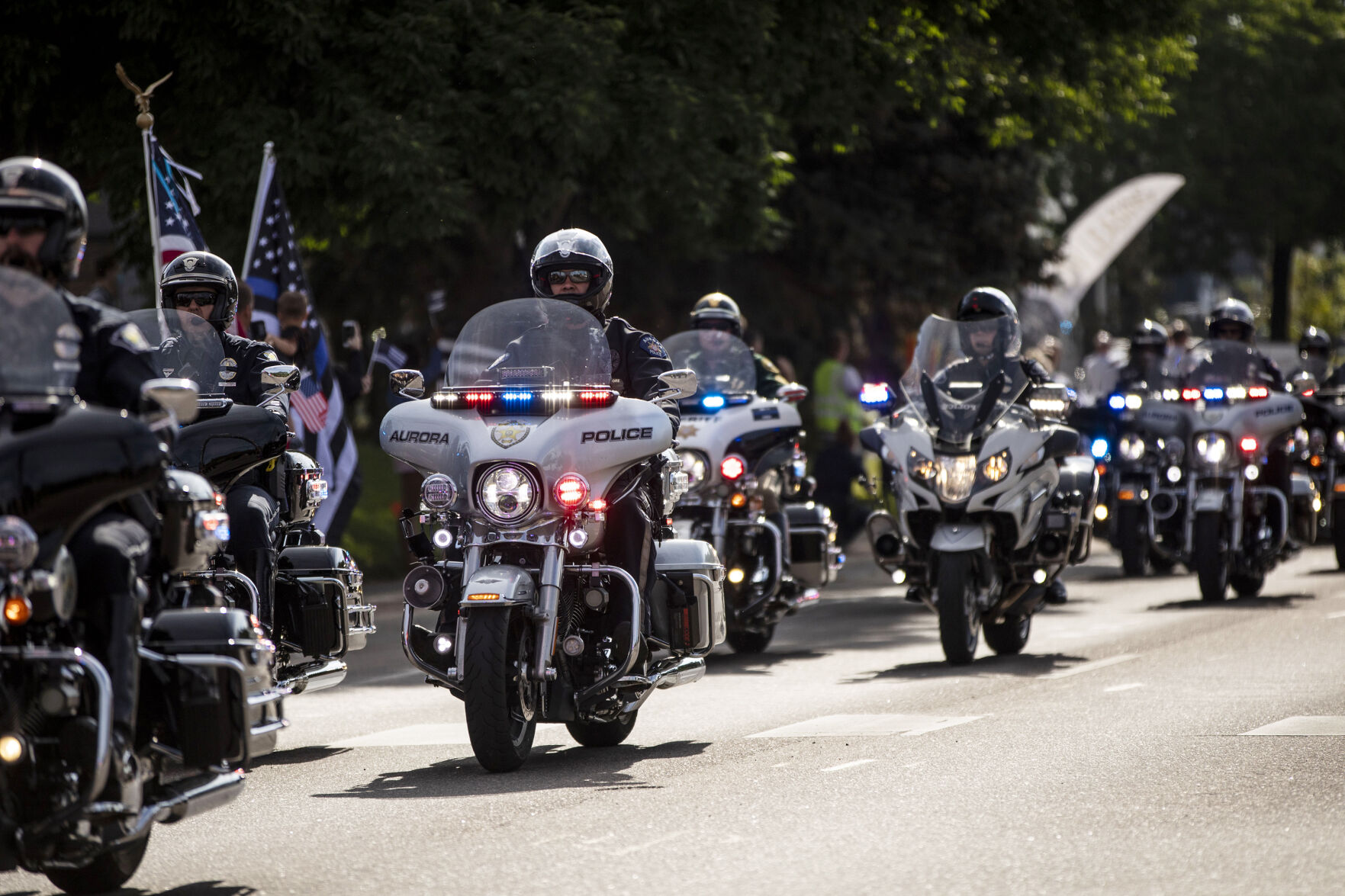 Law enforcement and first responders pay their respects to slain Arvada police officer Gordon Beesley during a funeral procession in Lafayette, Colo., on Tuesday, June 29, 2021. A funeral was held at the Flatirons Community Church for officer Beesley, who was a 19-year veteran of the Arvada Police Department. Officer Beesley was killed by a gunman in Olde Town Arvada on June 21, 2021. (Chancey Bush/ The Gazette) (Chancey Bush)