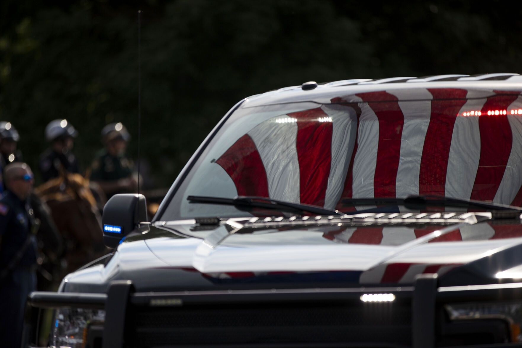 A funeral procession for slain Arvada police officer Gordon Beesley in Lafayette, Colo., on Tuesday, June 29, 2021. A funeral was held at the Flatirons Community Church for officer Beesley, who was a 19-year veteran of the Arvada Police Department. Officer Beesley was killed by a gunman in Olde Town Arvada plaza on June 21, 2021. (Chancey Bush/ The Gazette) (Chancey Bush)