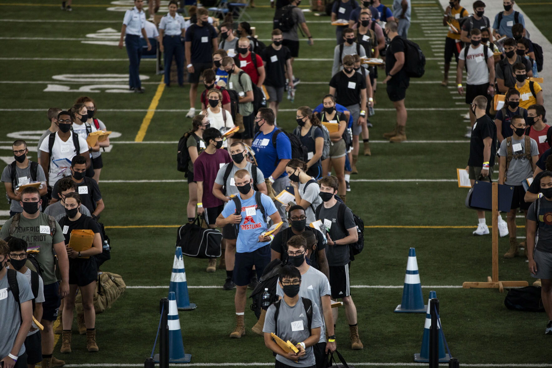 Incoming basic cadets at the Holaday Athletic Center during In-Processing Day at the United States Air Force Academy in Colorado Springs, Colo., on Thursday, June 24, 2021. Over 1,100 incoming freshman will undergo six weeks of basic training before officially becoming cadets. (Chancey Bush/ The Gazette) (Chancey Bush/ The Gazette)