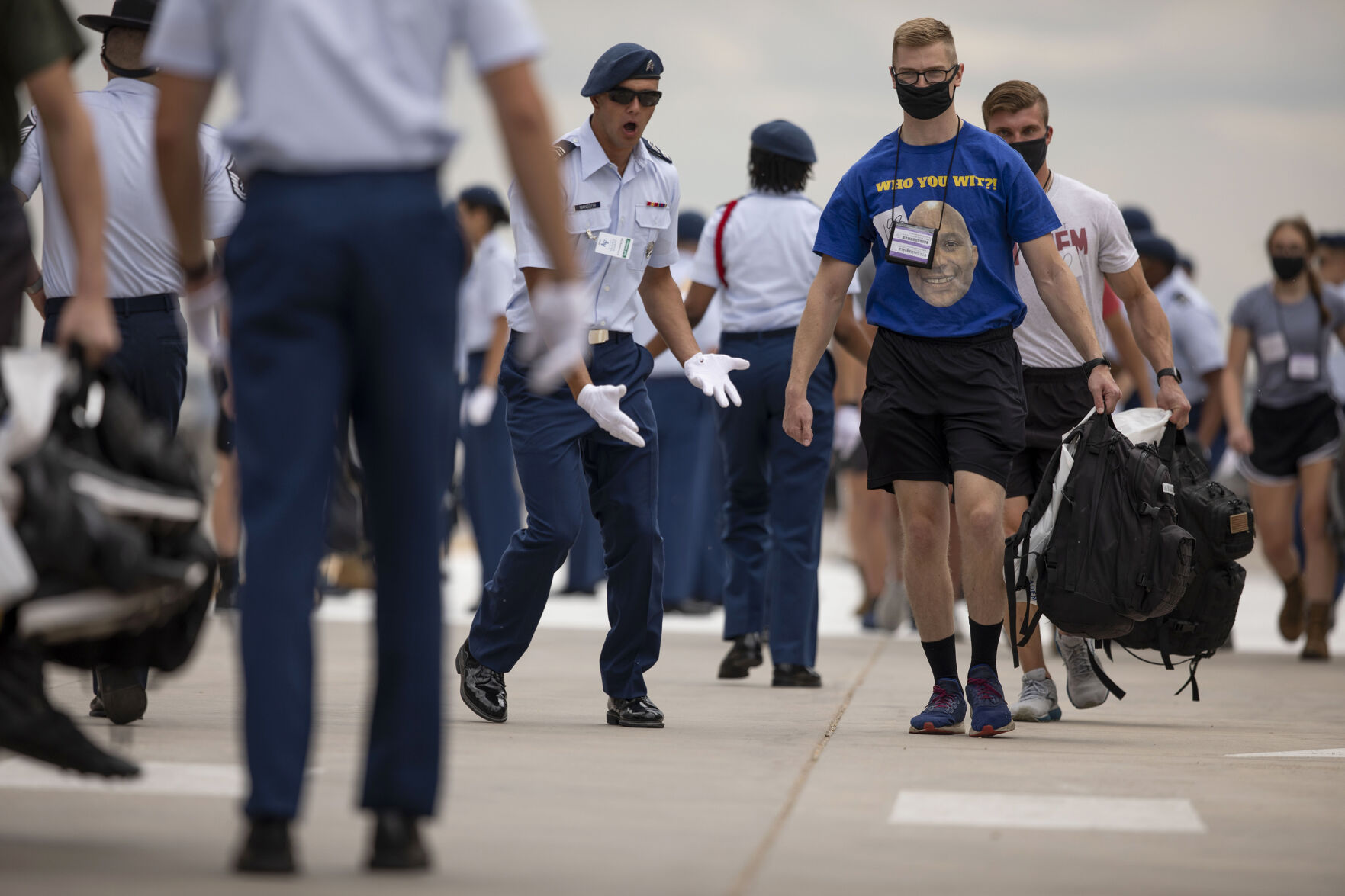 Basic cadets are yelled at by cadre members as they exit the bus during In-Processing Day at the United States Air Force Academy in Colorado Springs, Colo., on Thursday, June 24, 2021. Over 1,100 incoming freshman will undergo six weeks of basic training before officially becoming cadets.(Chancey Bush/ The Gazette) (Chancey Bush/ The Gazette)