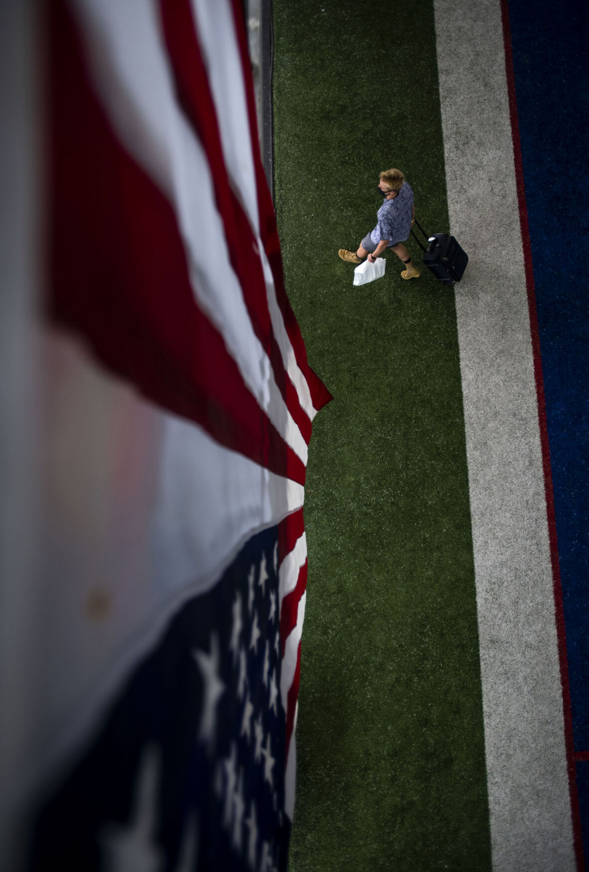 A basic cadet exits the Holaday Athletic Center during In-Processing Day at the United States Air Force Academy in Colorado Springs, Colo., on Thursday, June 24, 2021. Over 1,100 incoming freshman will undergo six weeks of basic training before officially becoming cadets.(Chancey Bush/ The Gazette) (Chancey Bush/ The Gazette)