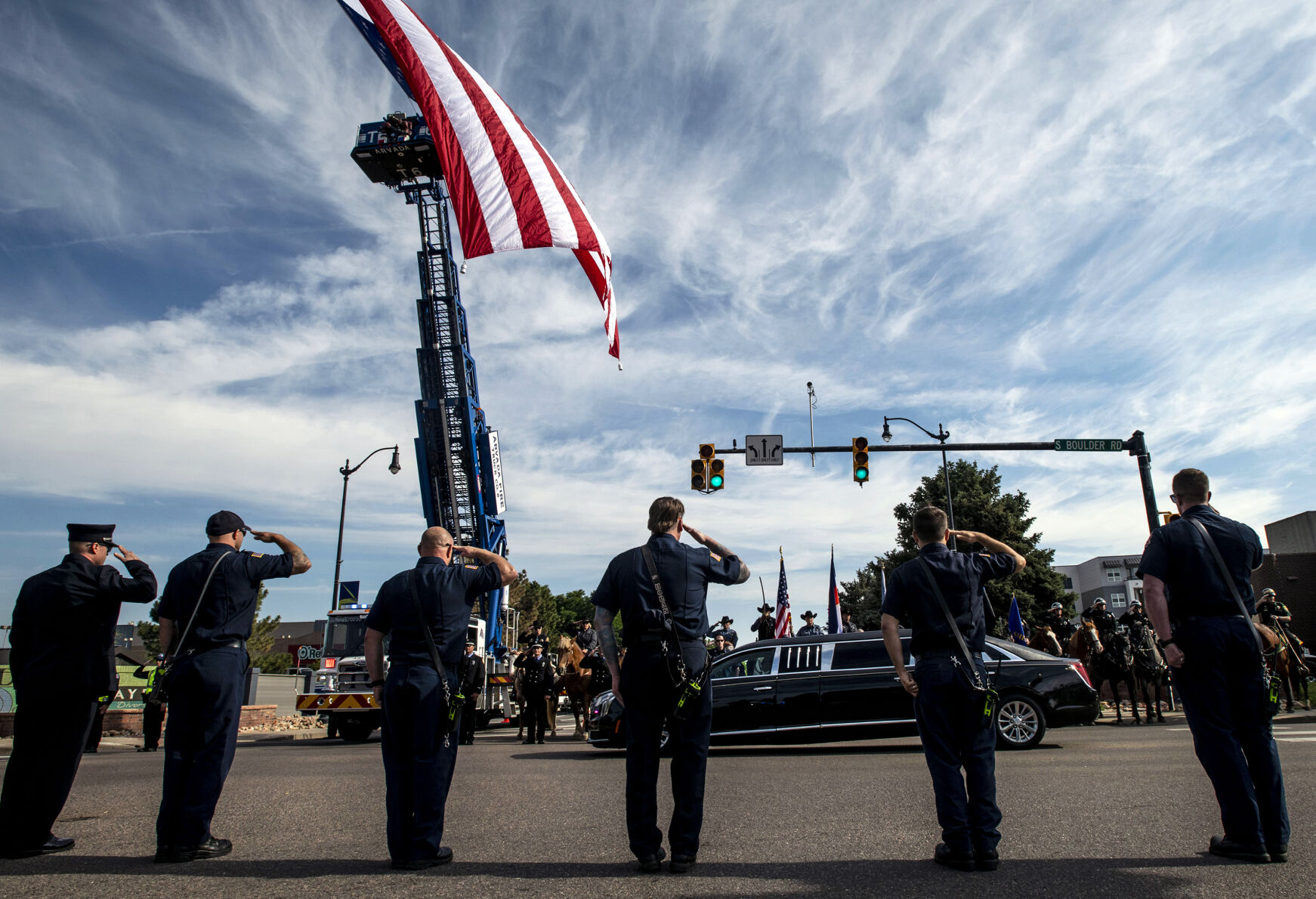 Law enforcement and first responders pay their respects to slain Arvada police officer Gordon Beesley during a funeral procession in Lafayette, Colo., on Tuesday, June 29, 2021. A funeral was held at the Flatirons Community Church for officer Beesley, who was a 19-year veteran of the Arvada Police Department. Officer Beesley was killed by a gunman in Olde Town Arvada plaza on June 21, 2021. (Chancey Bush/ The Gazette) (Chancey Bush)