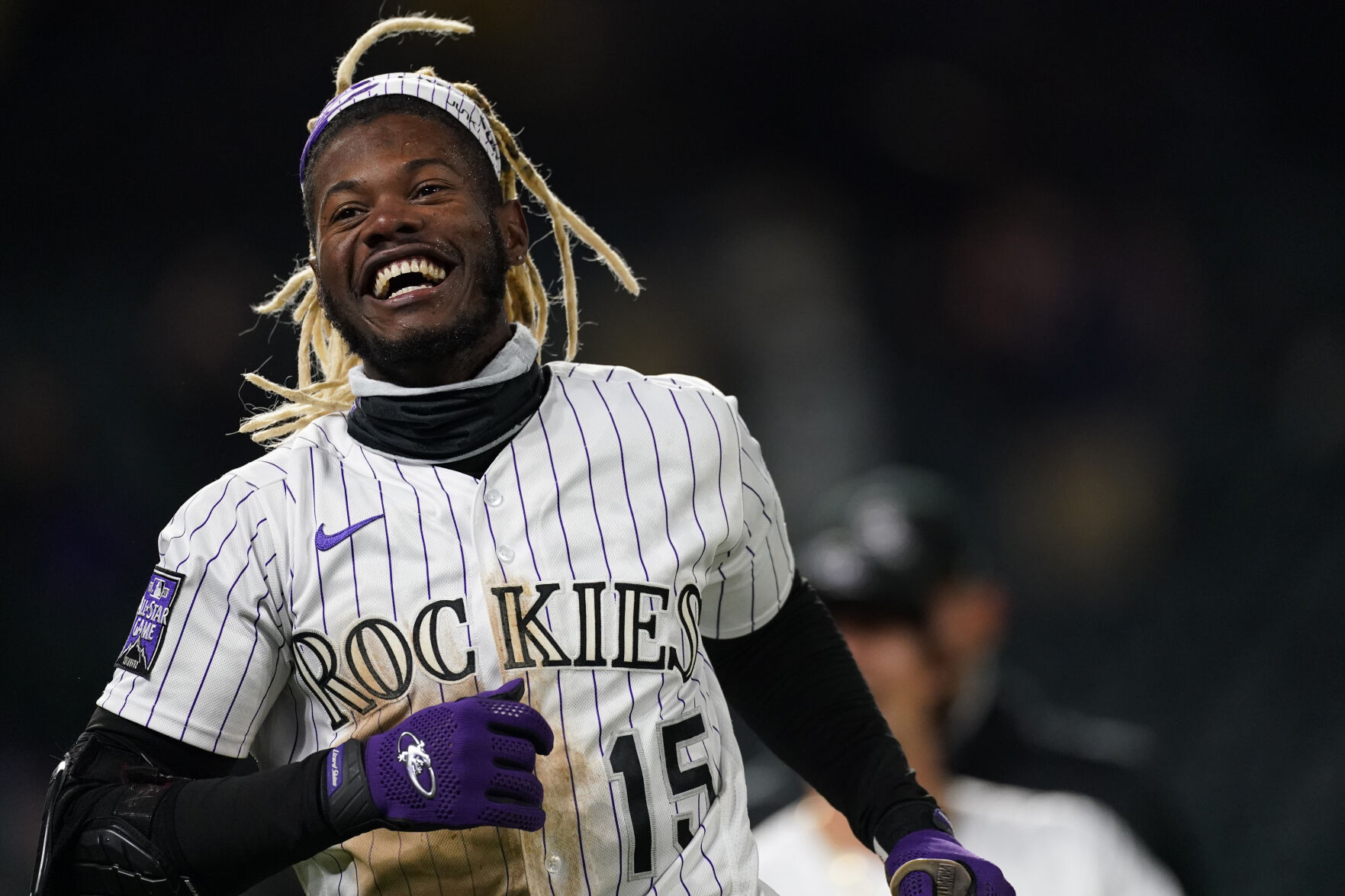 Colorado Rockies left fielder Raimel Tapia (15) in the ninth inning of a baseball game April 23, 2021, in Denver. The Rockies won 5-4. (AP Photo/David Zalubowski) (David Zalubowski)