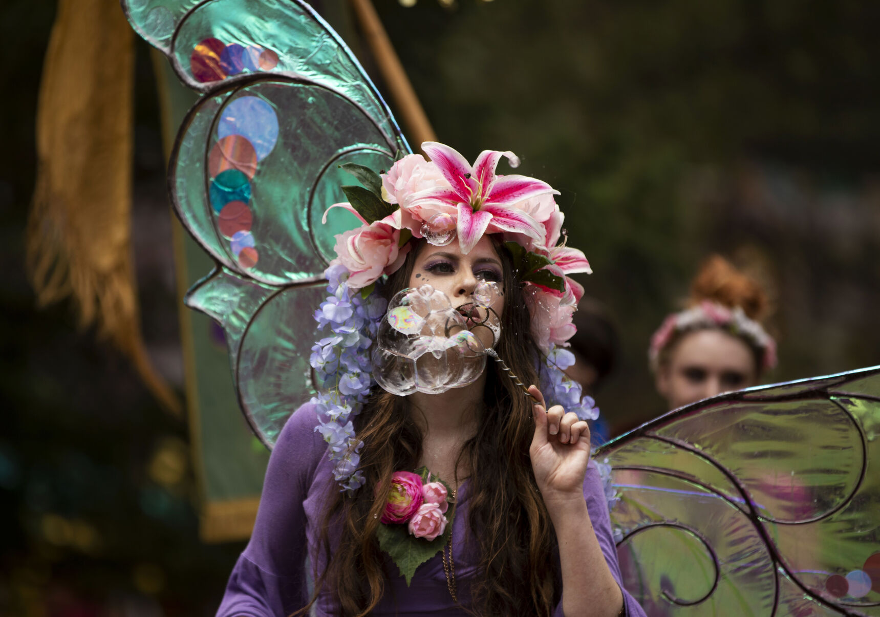 Primrose the Fairy blows bubbles during opening day of the 2021 Colorado Renaissance Festival in Larkspur, Colo., on July 3, 2021. The festival is back for their 44th season after being postponed by the COVID-19 pandemic last year. The Renaissance Festival is open for eight themed weekends, Saturdays and Sundays, through Aug. 22 in Larkspur, 650 W. Perry Park Ave. 10 a.m.-6:30 p.m. (Chancey Bush/ The Gazette) (Chancey Bush/ The Gazette)