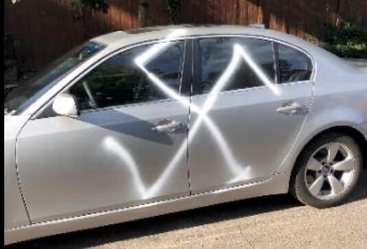 Denver police seek information about person who spray-painted swastika, racially motivated words on several cars