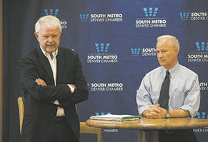 Former Gov. Dick Lamm, left, and U.S. Rep. Mike Coffman, R-Aurora, discuss the overwhelming national debt at a Fix the Debt forum sponsored by the South Metro Denver Chamber of Commerce in August 2013. (Colorado Politics file)
