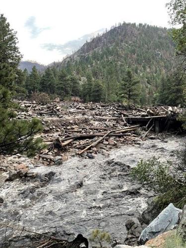 Third body recovered after flash flooding in Colorado, another person remains missing