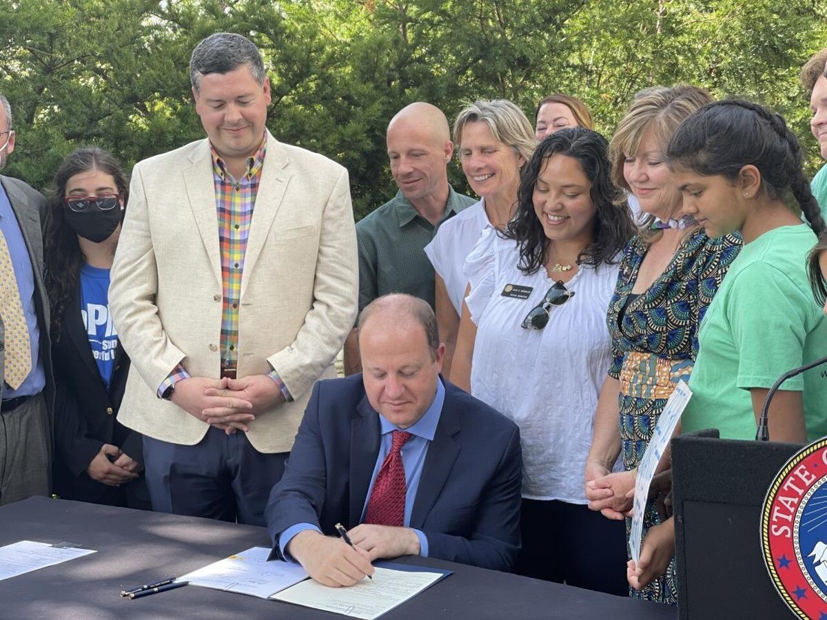 Polis signs ban on single-use plastics into Colorado law