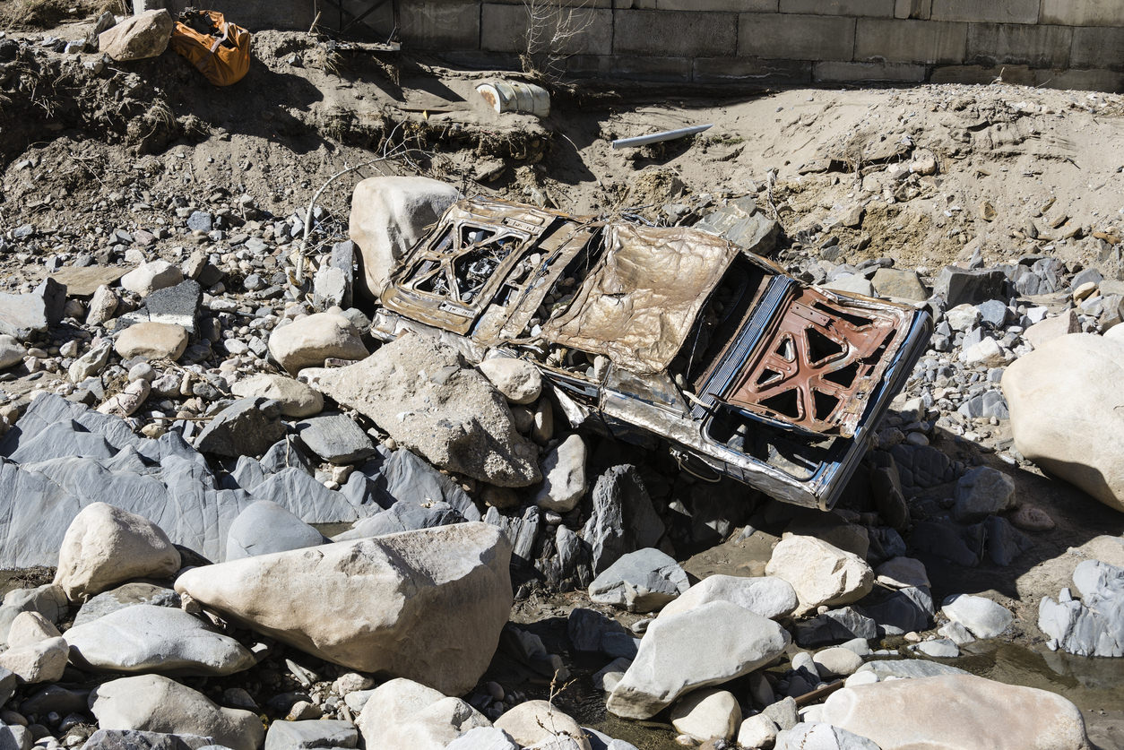 A car crushed during flooding of Big Thompson Canyon. Photo Credit: RiverNorthPhotography (iStock). (RiverNorthPhotography)