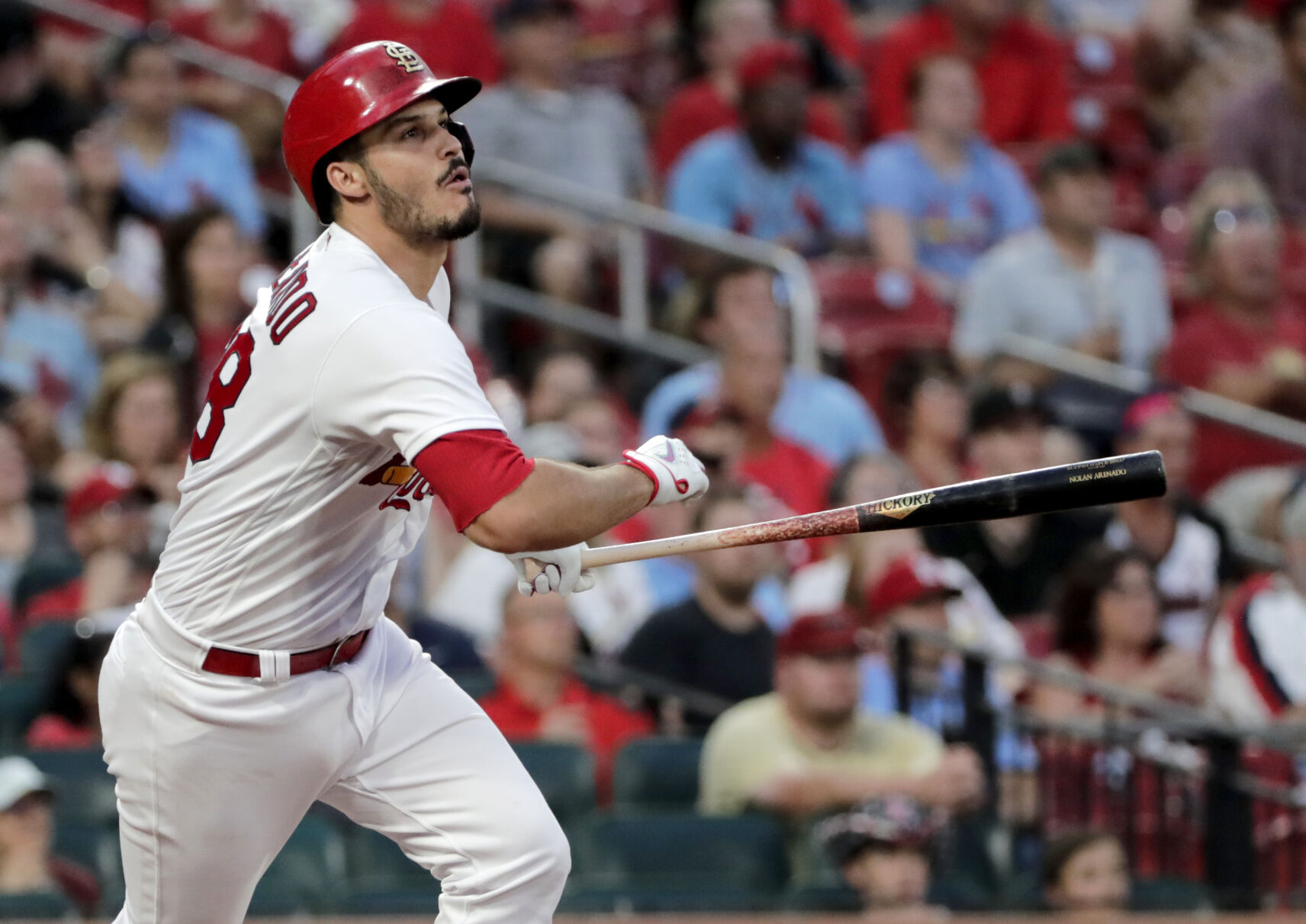St. Louis Cardinals' Nolan Arenado (28) starts to run as he watches his fly ball in the fifth inning of a baseball game against the Arizona Diamondbacks, Monday, June 28, 2021, in St. Louis. (AP Photo/Tom Gannam) (Tom Gannam)