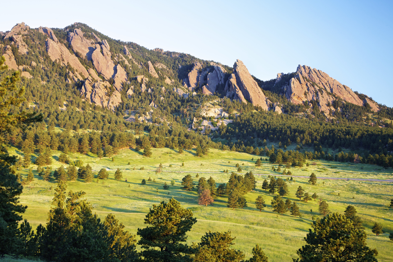 Sunrise over the Flatirons in Boulder, Colorado. Photo Credit: beklaus (iStock). (beklaus)