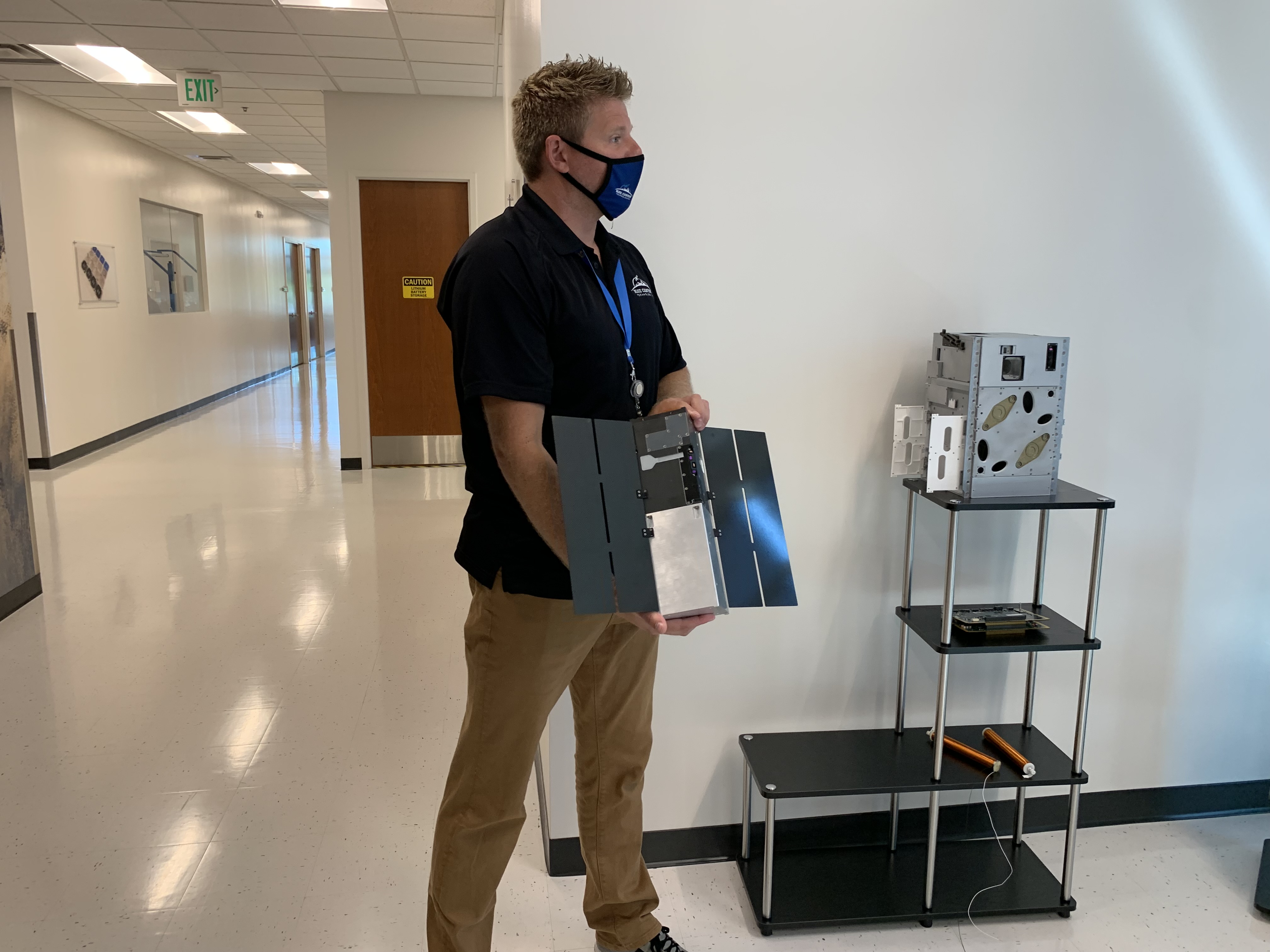 Lafayette-based Blue Canyon Technology's Josh Duncan shows one of the company's microsats (micro satellite). (DennisHuspeniCity Editordennis.huspeni@gazette.comhttps://denvergazette.com/content/tncms/avatars/c/5a/fbd/c5afbd32-5030-11eb-bdef-030d9de52a9e.779683cee495ffe64766291c251a8894.png)