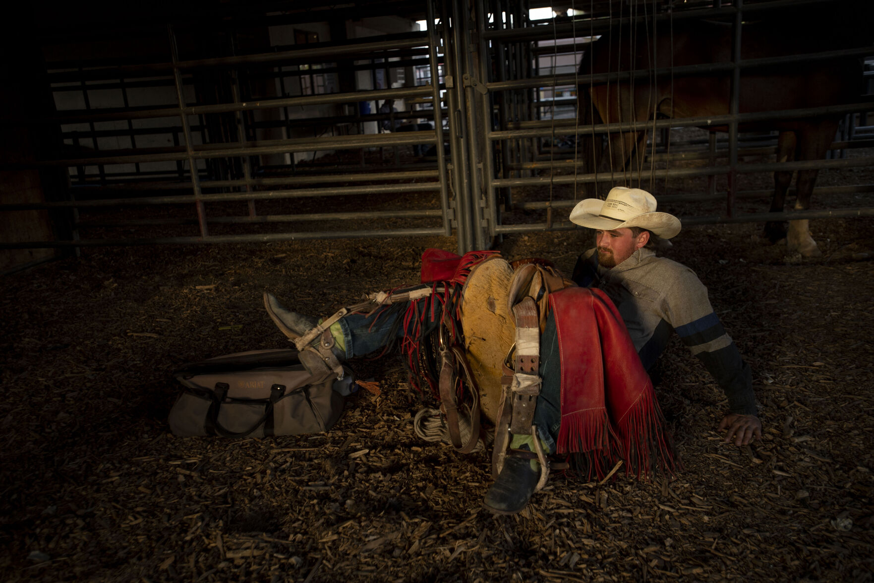 Cowboys prepare for the saddle bronc riding at the PRCA RAM Rodeo during the Colorado State Fair in Pueblo, Colo., on Friday, August 27, 2021. The fair kicked off on Friday and runs through Sept. 6. at the Colorado State Fairgrounds. (Chancey Bush/ The Gazette) (Chancey Bush/ The Gazette)