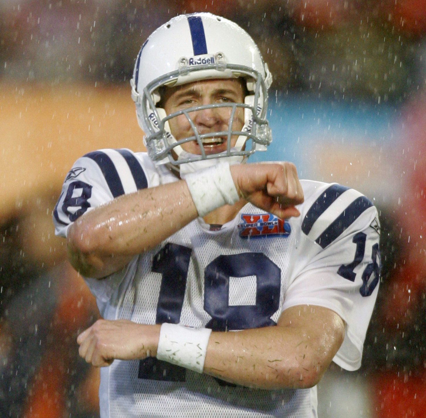 Indianapolis Colts quarterback Peyton Manning (18) reacts after a touchdown run by Dominic Rhodes during the second quarter of the Super Bowl XLI football game against the Chicago Bears at Dolphin Stadium in Miami on Sunday, Feb. 4, 2007. (AP Photo/Michael Conroy) (Michael Conroy)