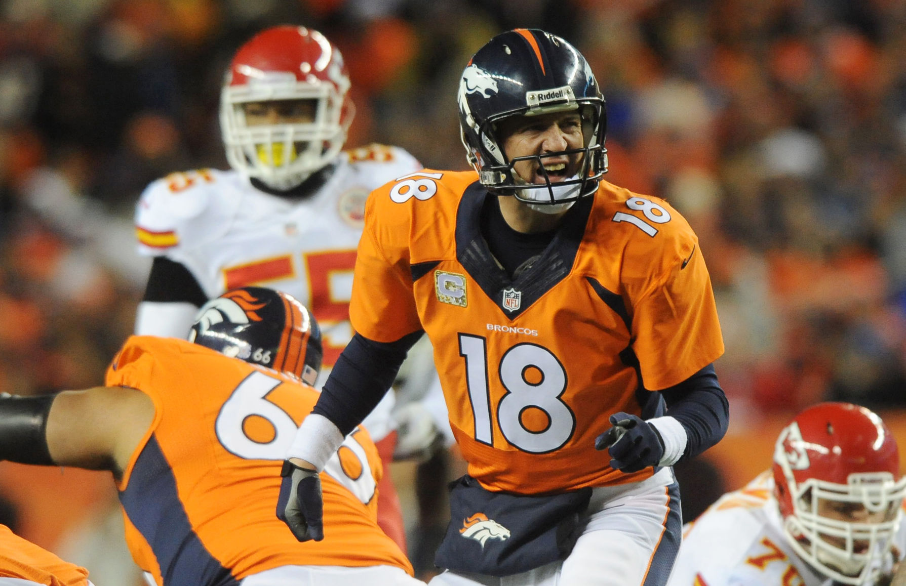 Broncos quarterback Peyton Manning turns around to yell commands to the offense during the second quarter. The Broncos defeated the Chiefs 27-17 at Sports Authority Field at Mile High Stadium on Sunday, November 17, 2013. (The Gazette/Jerilee Bennett) (JERILEE BENNETT)