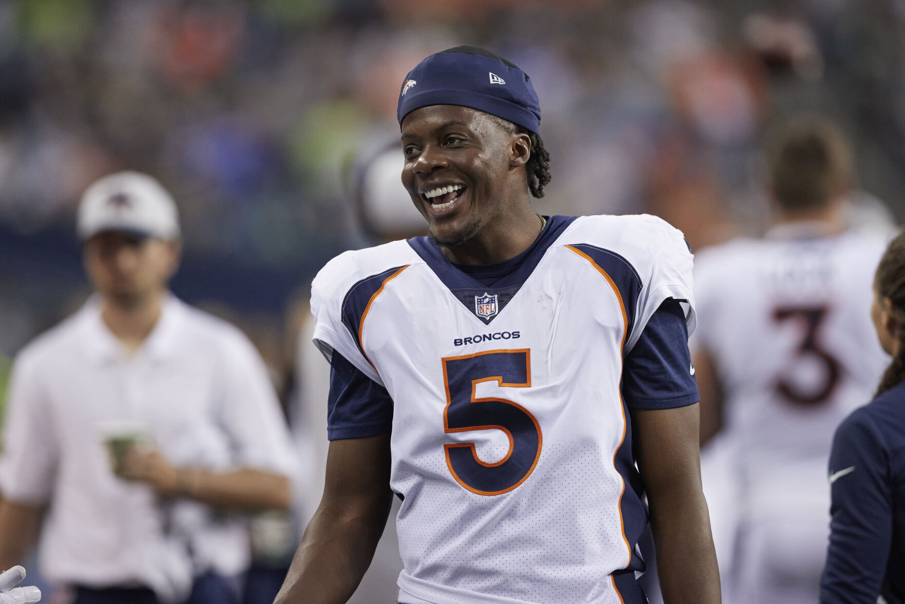 Denver Broncos quarterback Teddy Bridgewater smiles while on the sidelines against the Seattle Seahawks during the first half of an NFL preseason game, Saturday, Aug. 21, 2021, in Seattle. (AP Photo/John Froschauer) (John Froschauer)