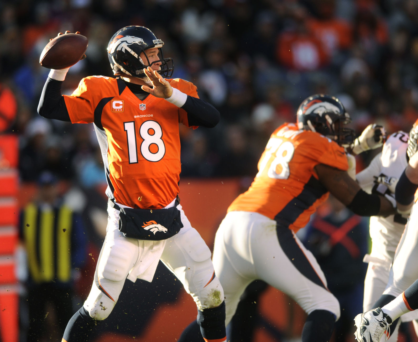 Broncos quarterback Peyton Manning throws in the second quarter of Denver's 34-12 win Sunday, December 23, 2012 at Sports Authority Field at Mile High. Photo by Mark Reis, The Gazette (MARK REIS, THE GAZETTE)