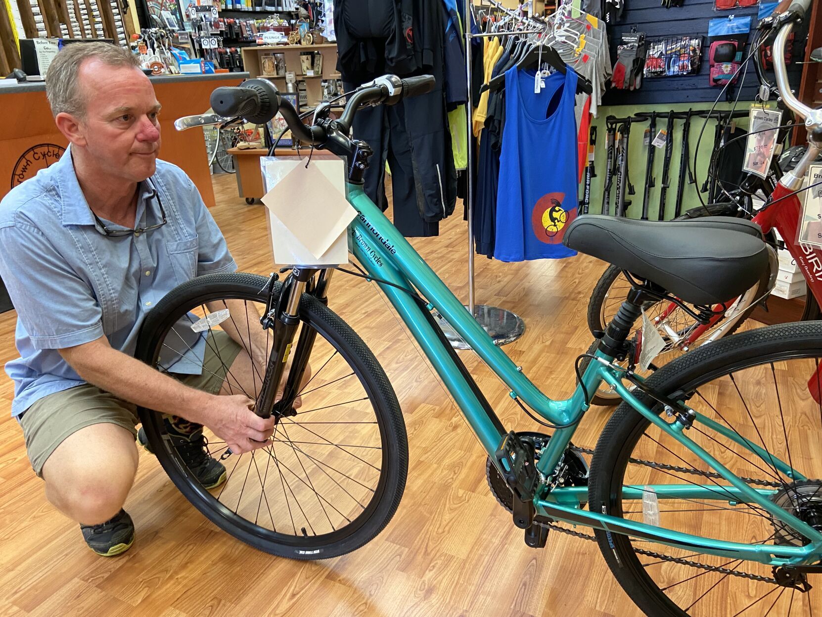 Chris Brown, the owner of Brown Cycles in Grand Junction, wrote “Bicycle Junction,” which was turned into an opera this year. (Photo by Michael Karlik, Colorado Politics)
