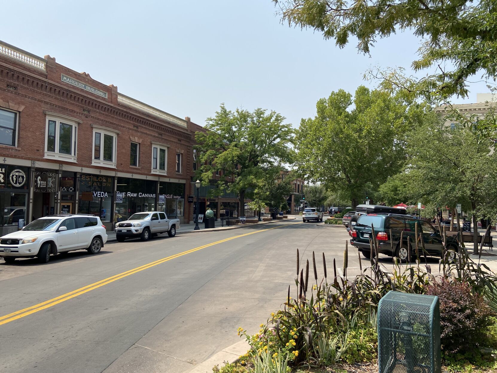 Main Street in Grand Junction, which is designed to be a tree-lined, curving shopping district that is pedestrian friendly. (Michael Karlik, colorado politics)
