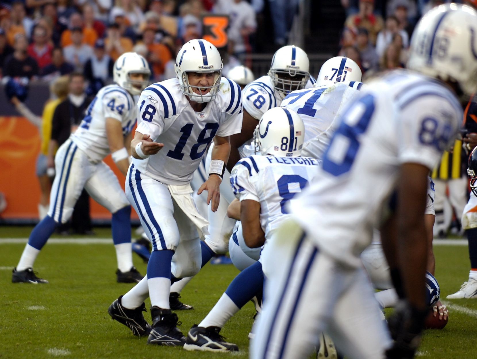 Colts quarterback Peyton Manning calls a play at the line while the Denver crowd screams during a football game against the Broncos at Invesco Field at Mile High in Denver, Colo., on Sunday, Oct. 29, 2006. The Colts won the game 34-31 on a last second field goal. Photo by David Bitton (David Bitton)