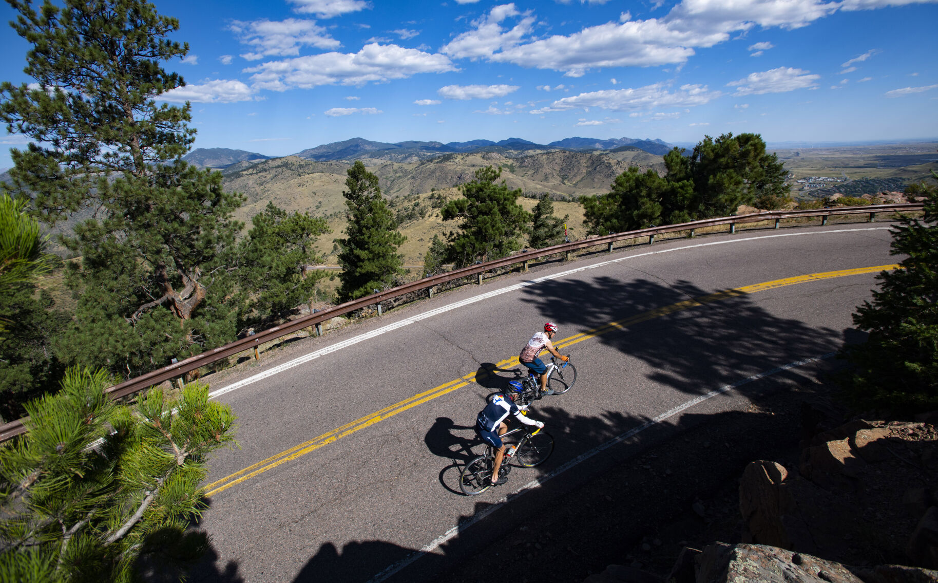 Cyclists tackle the final climb to the top of 7,377-foot Lookout Mountain Tuesday, Aug. 24, 2021, outside Golden, Colo. (The Gazette, Christian Murdock) (Christian Murdock/The Gazette)