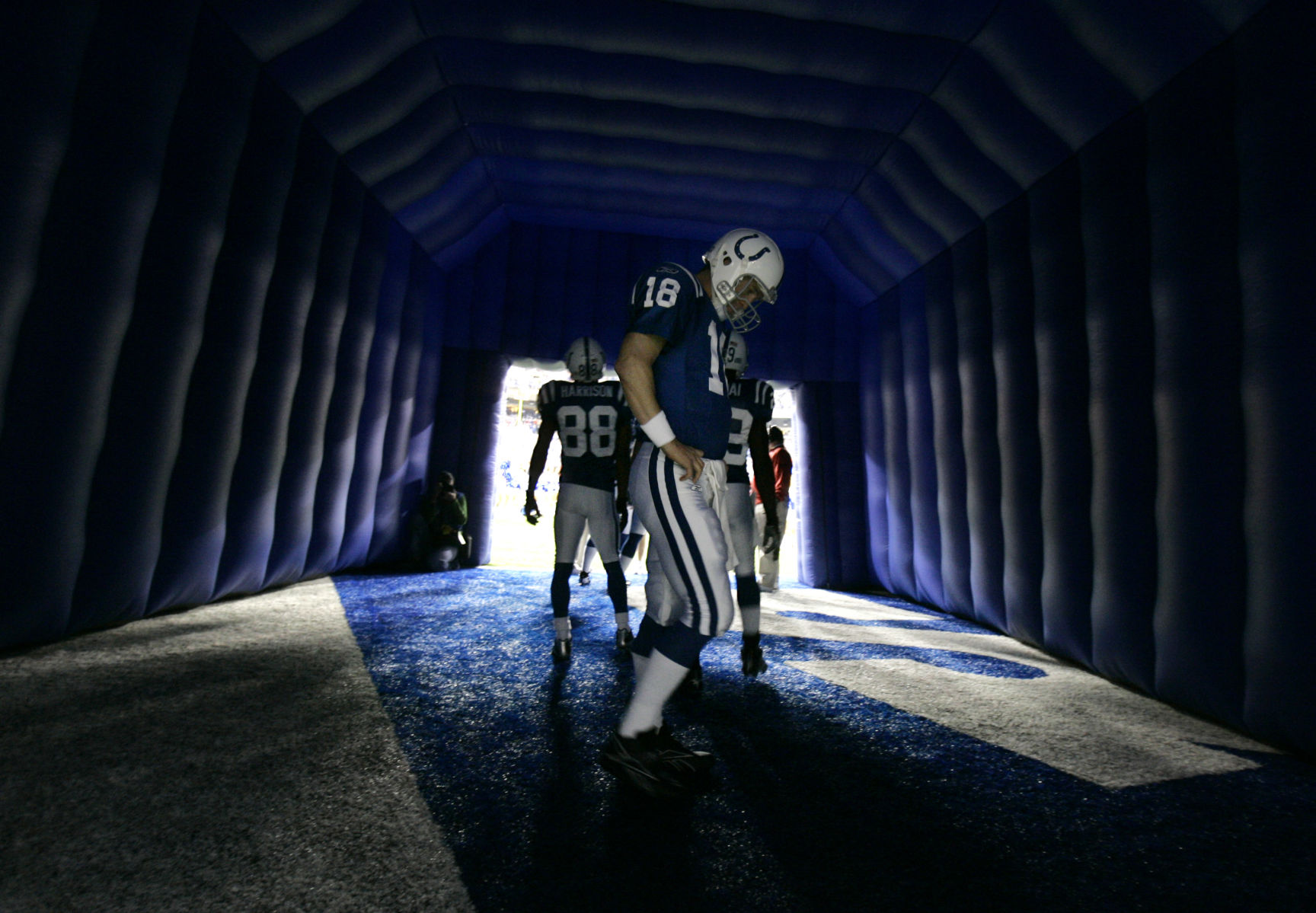 Indianapolis Colts quarterback Peyton Manning (18) waits in the tunnel to take the field against the Kansas City Chiefs in their AFC wild-card playoff football game in Indianapolis, Saturday, Jan. 6, 2007. The Colts take on the Baltimore Ravens on Saturday, Jan. 13, in a AFC divisional playoff game in Baltimore.(AP Photo/Darron Cummings) (Darron Cummings)