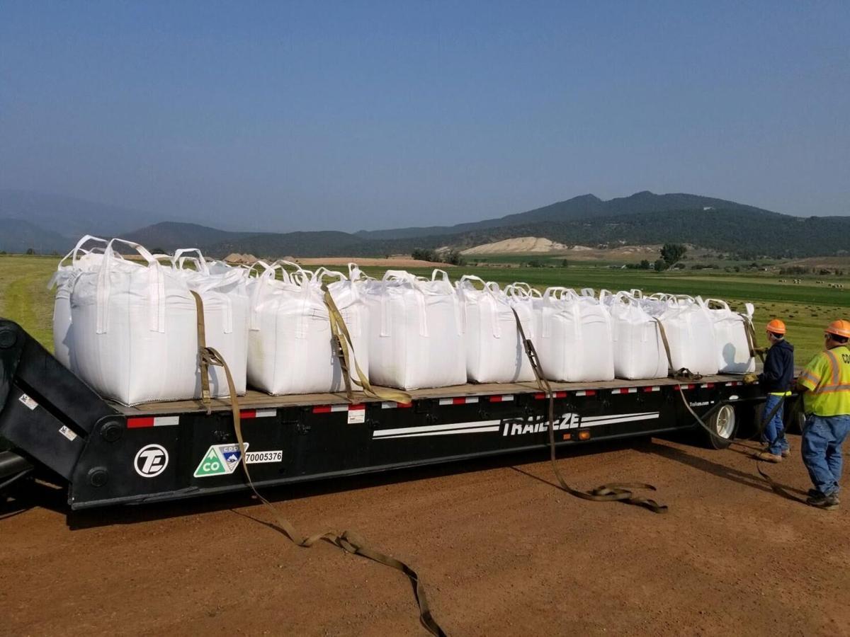 Car-sized bags of sand to protect flood-threatened interstate in Colorado