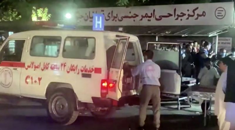 A screen grab shows an emergency vehicle as people arrive at a hospital after an attack at Kabul airport, in Kabul, Afghanistan August 26, 2021. REUTERS TV/via REUTERS (REUTERS TV)