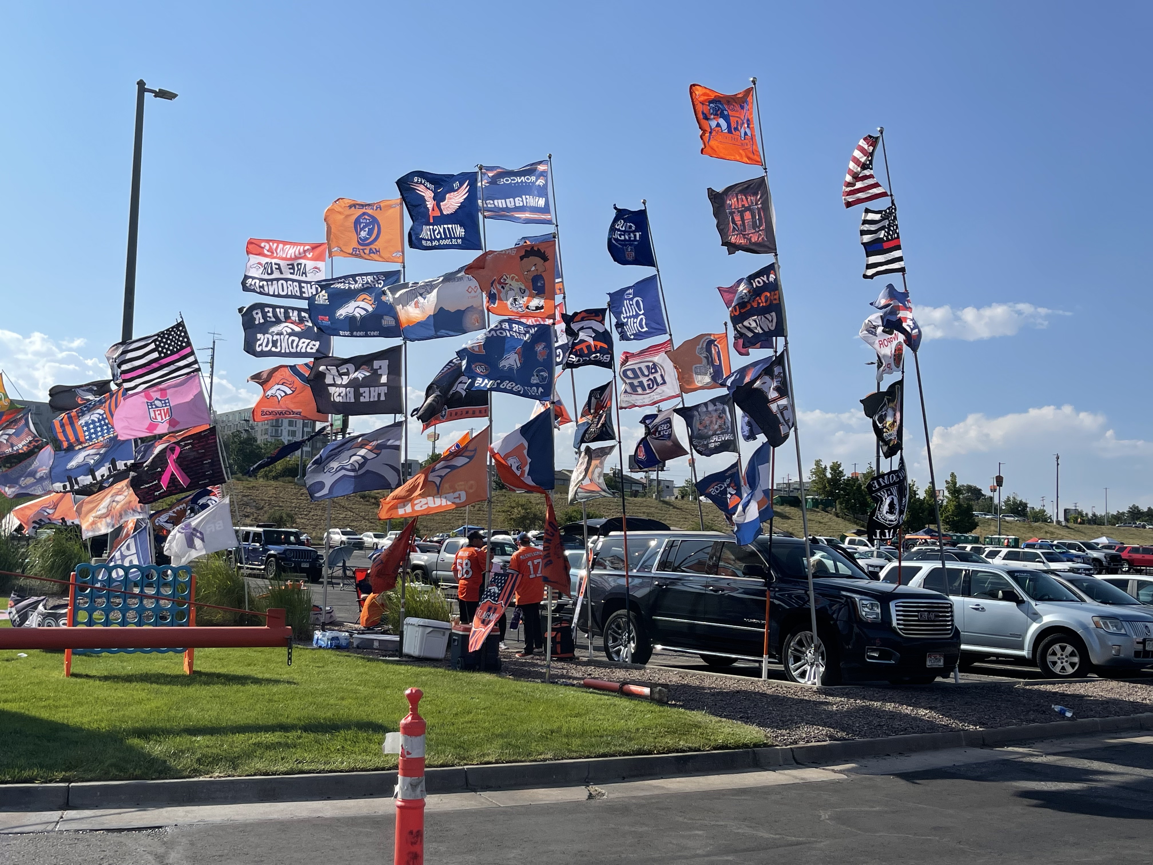 Scott Hood of Loveland's 64 flags blow in the air at the Broncos tailgate outside Empower Field at Mile High on Saturday Aug. 28, 2021 (DavidMullenBreaking News Reporterdavid.mullen@gazette.comhttps://secure.gravatar.com/avatar/349fcb3ec304c9bbf2b50a05578938e7?d=mm&r=g)