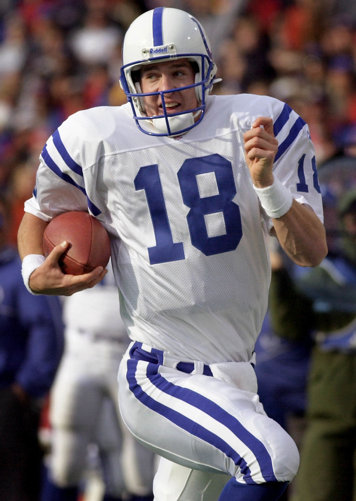 Indianapolis Colts quarterback Peyton Manning finds himself all alone as he runs 33-yards for a touchdown during the second quarter against the Buffalo Bills at Ralph Wilson Stadium in Orchard Park, N.Y., Sunday, Nov. 4, 2001. (AP Photo/Kevin Rivoli) (KEVIN RIVOLI)