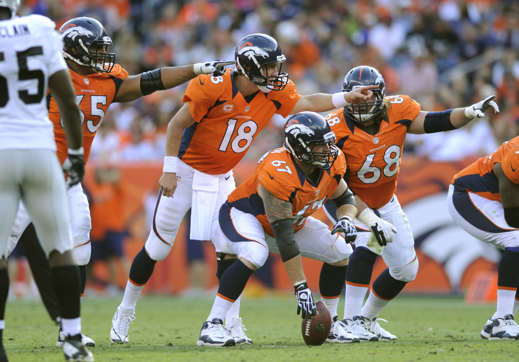 Denver Broncos quarterback Peyton Manning directs the offense in the second half of Denver's 37-6 win over the Raiders Sunday, September 30, 2012 at Sports Authority Field at Mile High. Photo by Mark Reis, The Gazette (MARK REIS, THE GAZETTE)