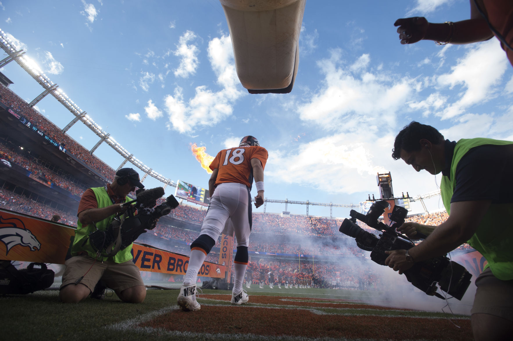 Peyton Manning takes the field at the start of Denver's season opener against the Indianapolis Colts Sunday, September 7, 2014 at Sports Authority Field at Mile High. Photo by Mark Reis, The Gazette (MARK REIS)