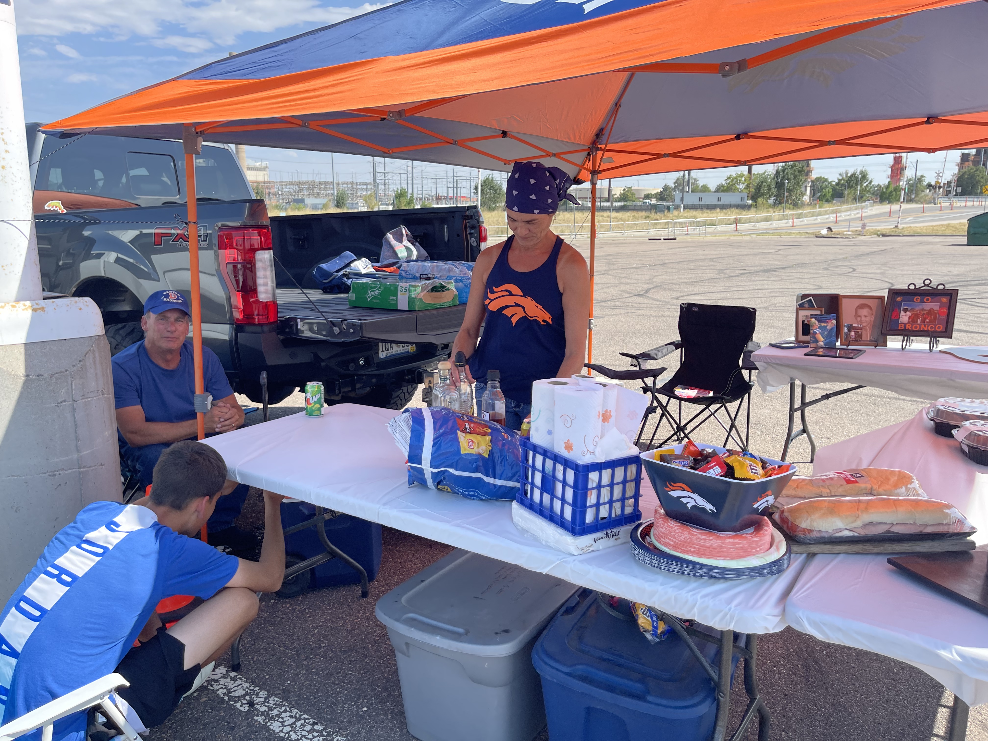 The Look family prepares for their annual tailgate prior to the Broncos first home game of the season on Aug. 28, 2021 (DavidMullenBreaking News Reporterdavid.mullen@gazette.comhttps://secure.gravatar.com/avatar/349fcb3ec304c9bbf2b50a05578938e7?d=mm&r=g)