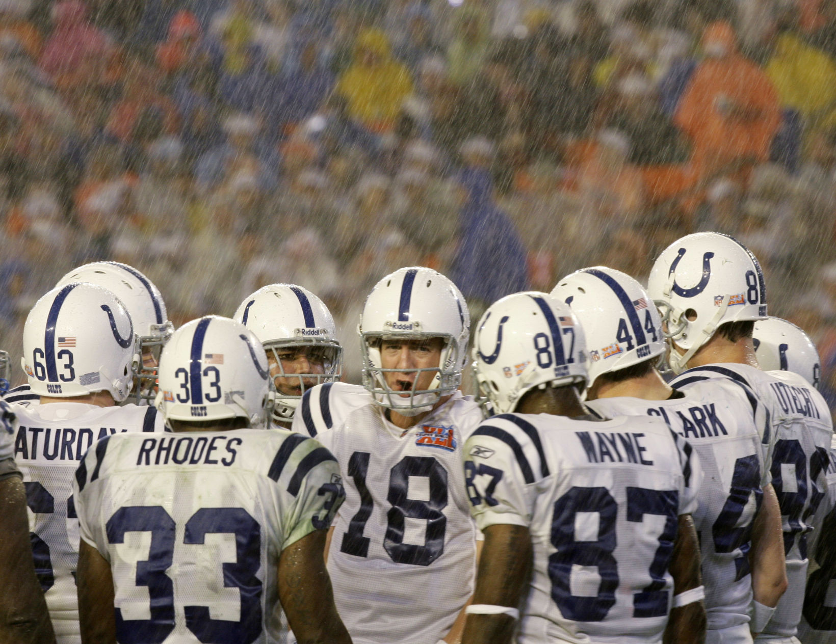 Indianapolis Colts quarterback Peyton Manning (18) directs his team in the huddle in the third quarter of the Super Bowl XLI football game against the Chicago Bears at Dolphin Stadium in Miami on Sunday, Feb. 4, 2007. (AP Photo/Alex Brandon) (Alex Brandon)