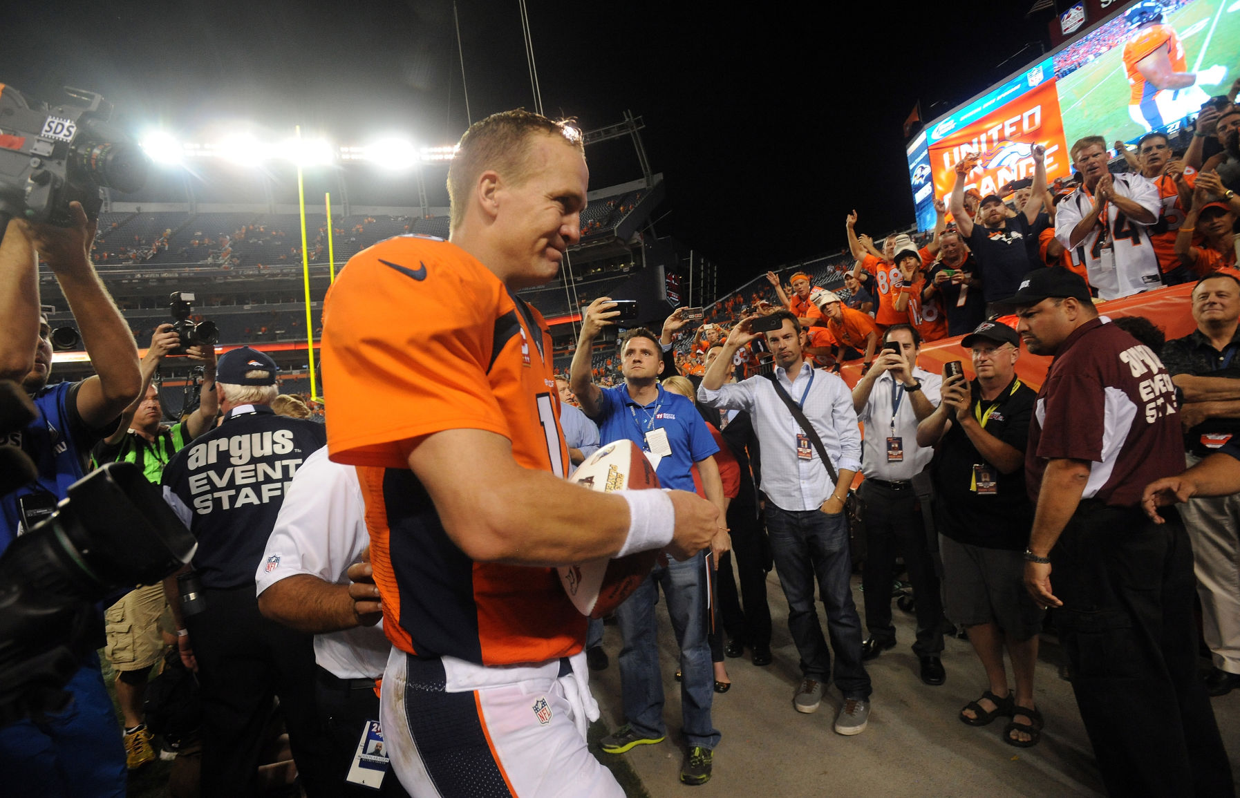 Broncos quarterback Peyton Manning leaves the field after throwing seven touchdown passes Thursday, Sept. 5, 2013, in the Broncos' 49-27 win over the Super Bowl champions Baltimore Ravens at Sports Authority Field at Mile High in Denver. (The Gazette, Christian Murdock) (CHRISTIAN MURDOCK)