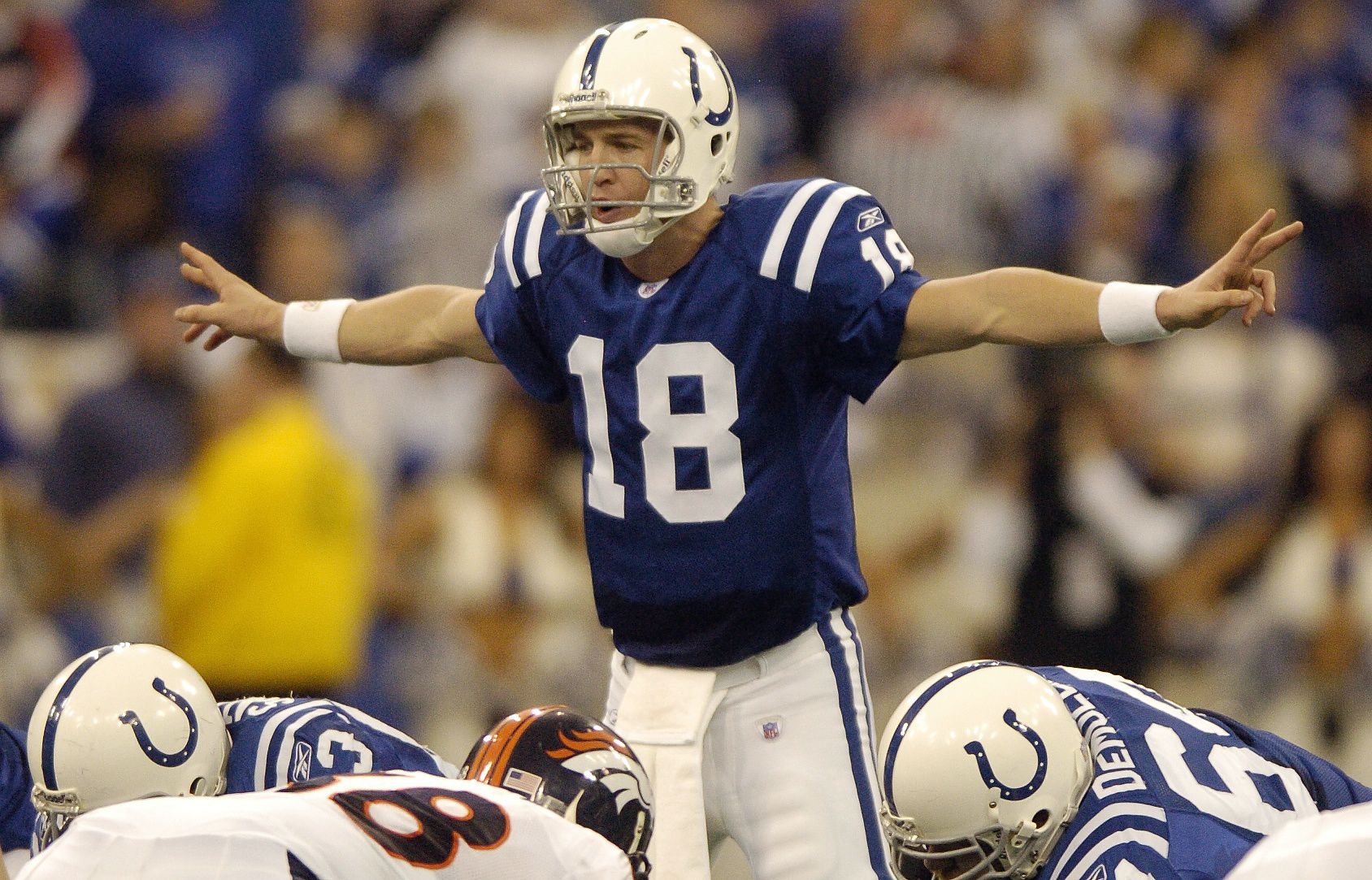 Colts quarterback Peyton Manning prepares to hike the ball during the second quarter of a AFC wild-card playoff game against the Broncos at the RCA Dome in Indianapolis, Indiana, on Sunday, Jan. 9, 2005. The Colts won the game 49-24. Photo by David Bitton (David Bitton)