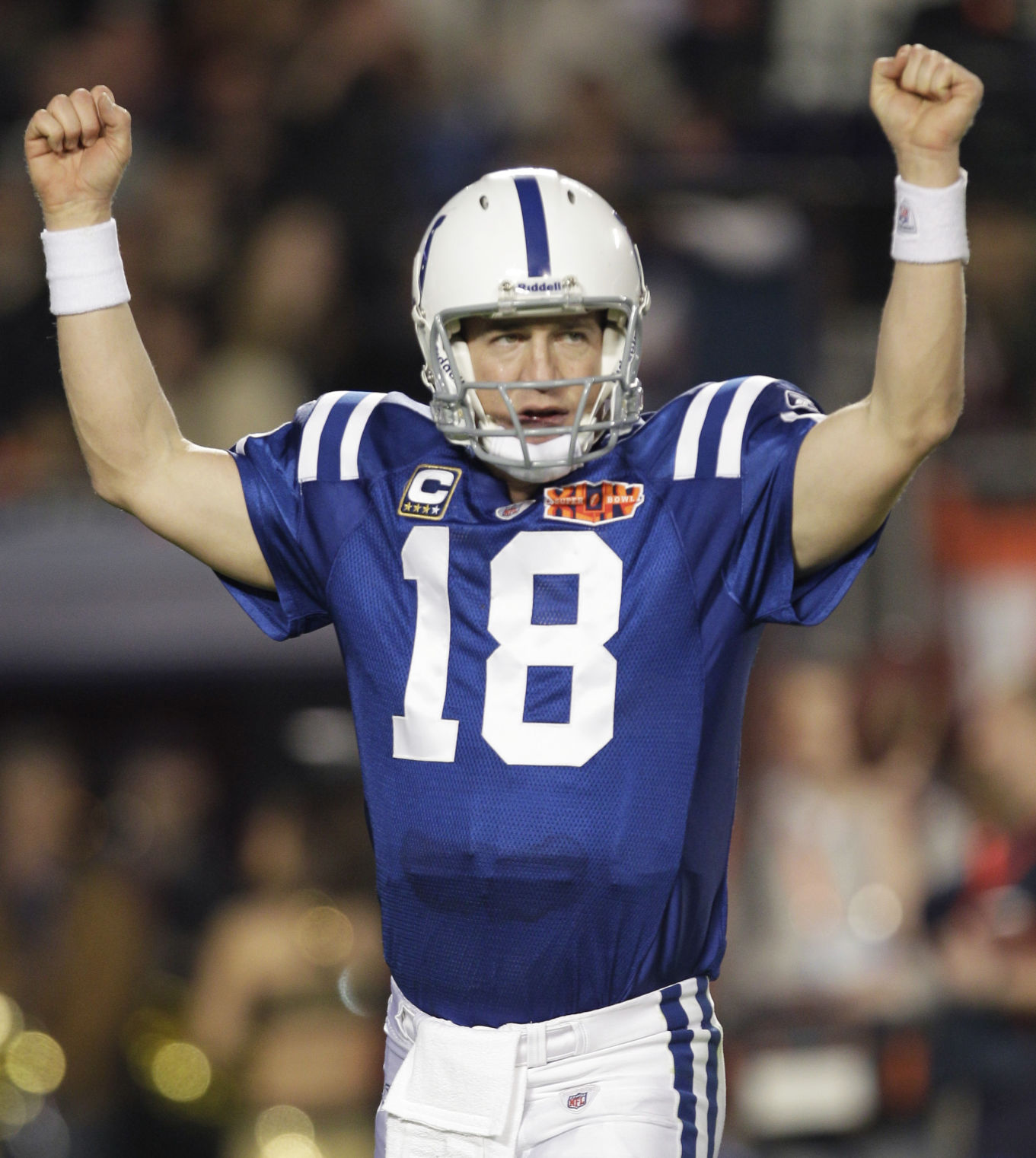 Indianapolis Colts quarterback Peyton Manning (18) reacts after teammate Joseph Addai's 4-yard touchdown run during the second half of the NFL Super Bowl XLIV football game in Miami, Sunday, Feb. 7, 2010. (AP Photo/Paul Sancya) (Paul Sancya)