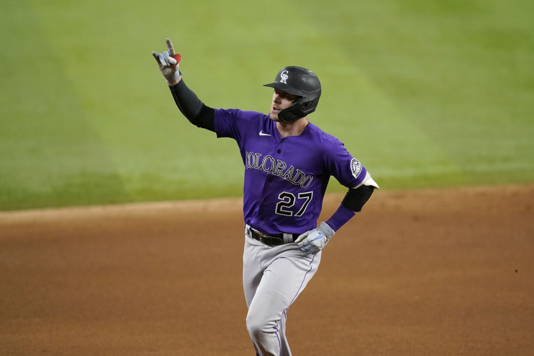 Colorado Rockies' Trevor Story rounds the bases after hitting a two-run home run in the eighth inning of a baseball game against the Texas Rangers in Arlington, Texas, Monday, Aug. 30, 2021. (AP Photo/Tony Gutierrez) (Tony Gutierrez)