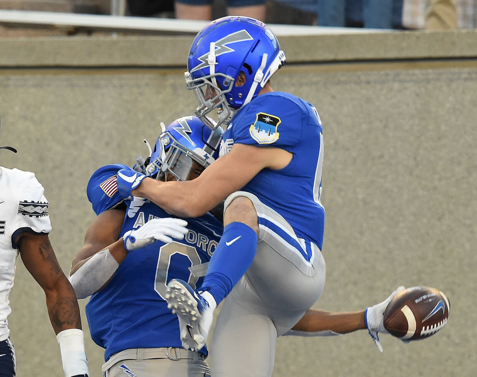 Air Force wide receiver Micah Davis (left) is congratulated by teammate Brandon Lewis after Davis scored a touchdown in the second quarter of a game at Falcon Stadium in Colorado Springs, Colorado on Saturday, Sept. 18, 2021. (Photo by Jerilee Bennett, The Gazette) (JERILEE BENNETT, THE GAZETTE)