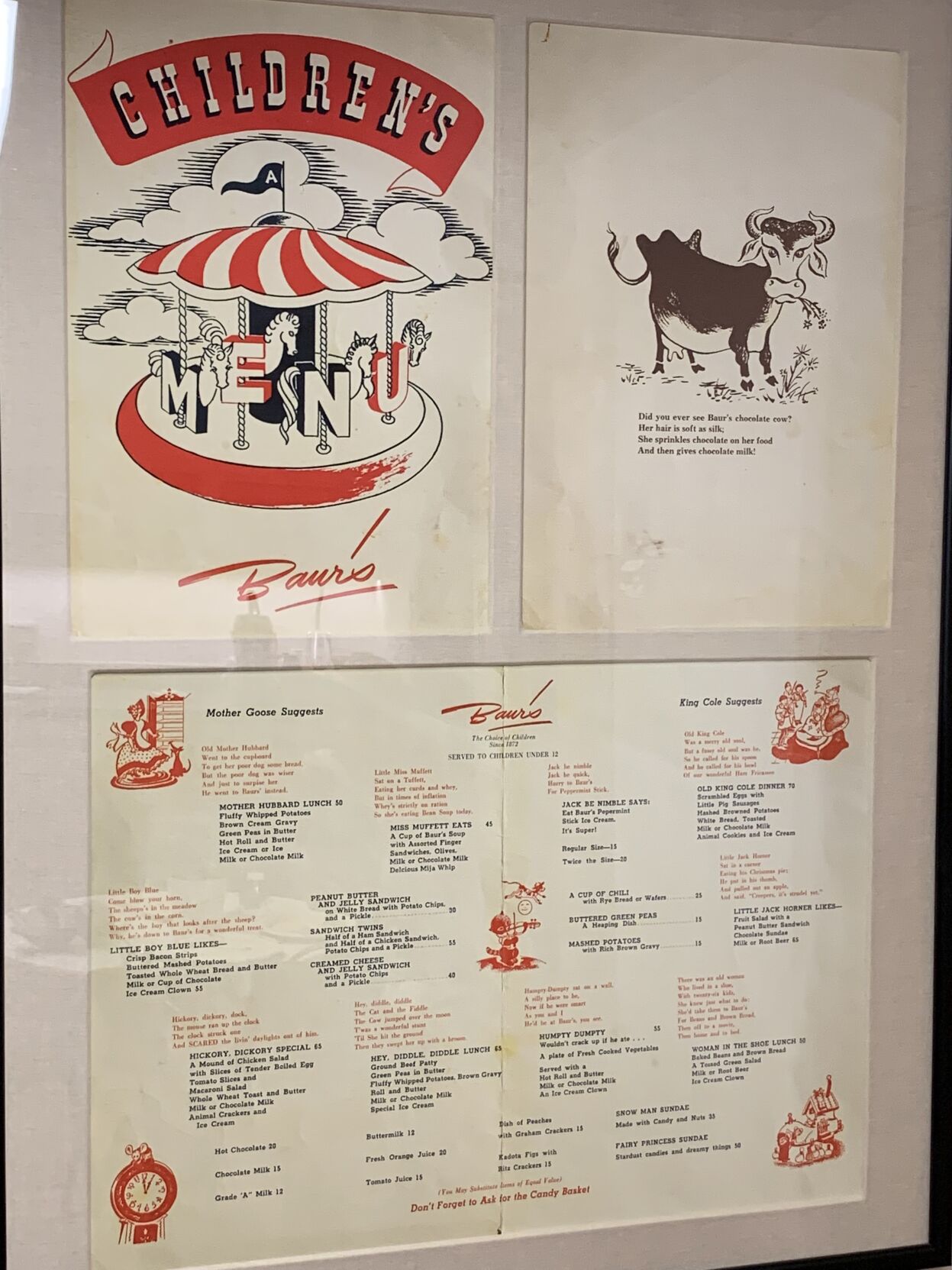 An old children's menu from Baur's restaurant on the kitchen wall of the Candy Factory's co-working space, 1514 Curtis St. It's just one example of the nods to the history of the building being the longtime home of O.P. Bauer Confectionery Co. (Dennis Huspeni, The Denver Gazette)