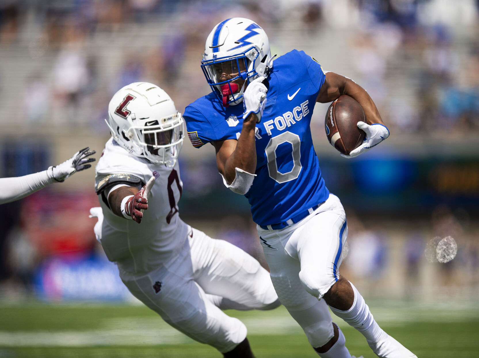 Air Force wide receiver Micah Davis (0) drives the ball in for a touchdown during the second quarter against the Lafayette Leopards at Falcon Stadium at the United States Air Force Academy in Colorado Springs, Colo. on Sept. 4, 2021. The Air Force Falcons won the game against the Lafayette Leopards by a score of 35-14. (Chancey Bush/ The Gazette) (Chancey Bush/ The Gazette)