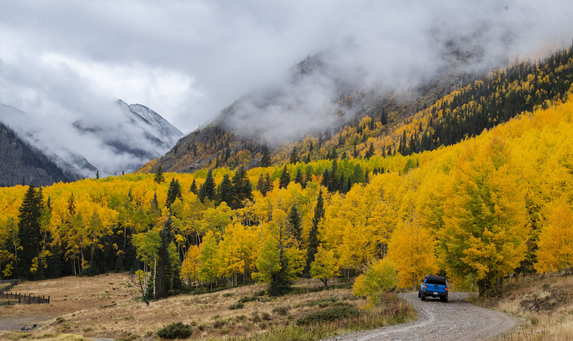 A jeep climbs Engineer Pass through the turning aspens outside Lake City, Colo., Tuesday, Sept. 28, 2021, as a storm moves through the San Juan Mountains bringing rain and snow. (The Gazette, Christian Murdock) (Christian Murdock/The Gazette)