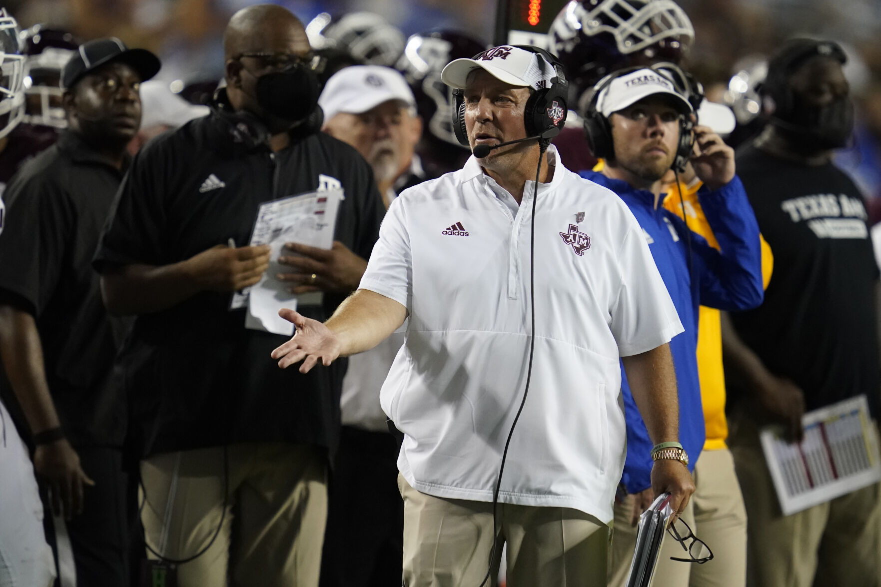 Texas A&M head coach Jimbo Fisher argues a call with a referee during the first half of an NCAA college football game against Kent State on Saturday, Sept. 4, 2021, in College Station, Texas. (AP Photo/Sam Craft) (Sam Craft)