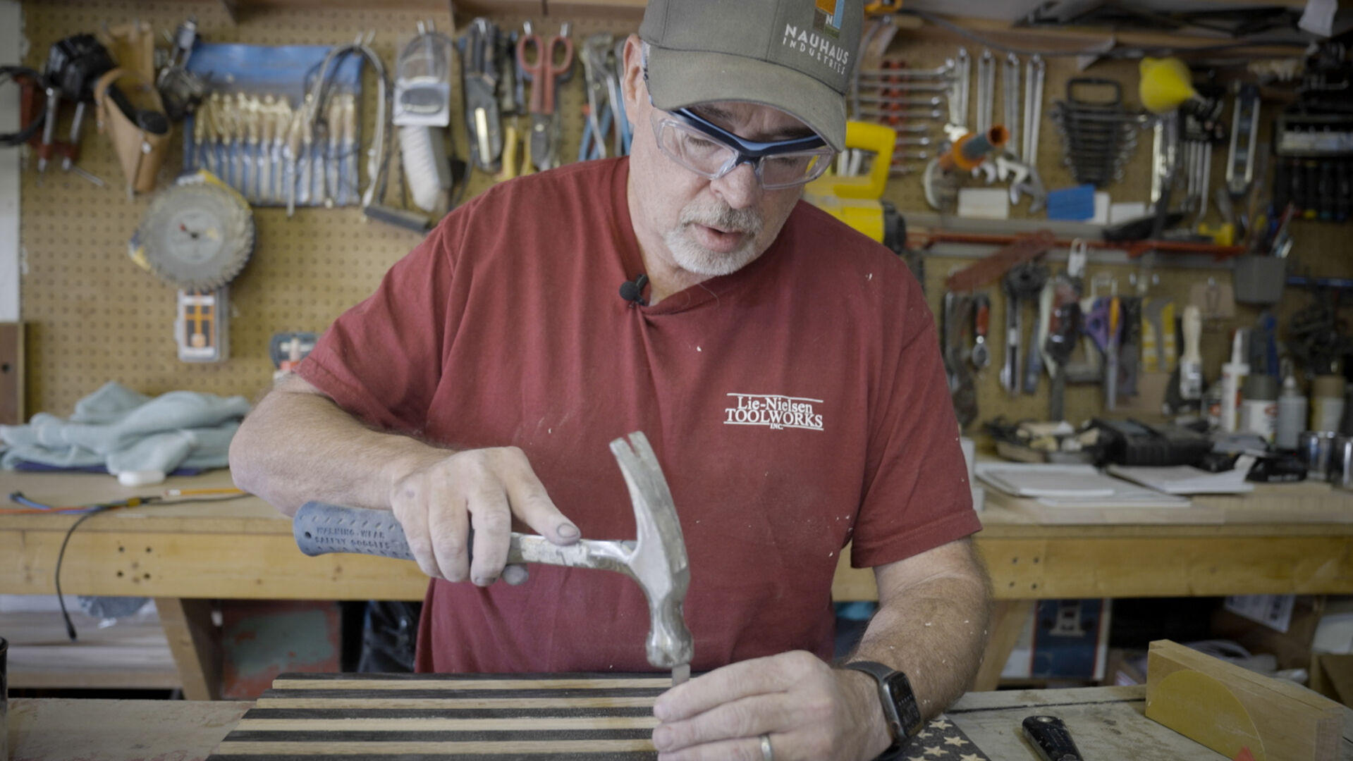{p class=”p1”}Centennial local Randy Hass began woodworking in high school and turned the passion into a career. After the Arvada shooting, he began making wooden flags to honor police officers as a way of giving back. (Photo by Skyler Ballard){/p} (Skyler Ballard / The Gazette)