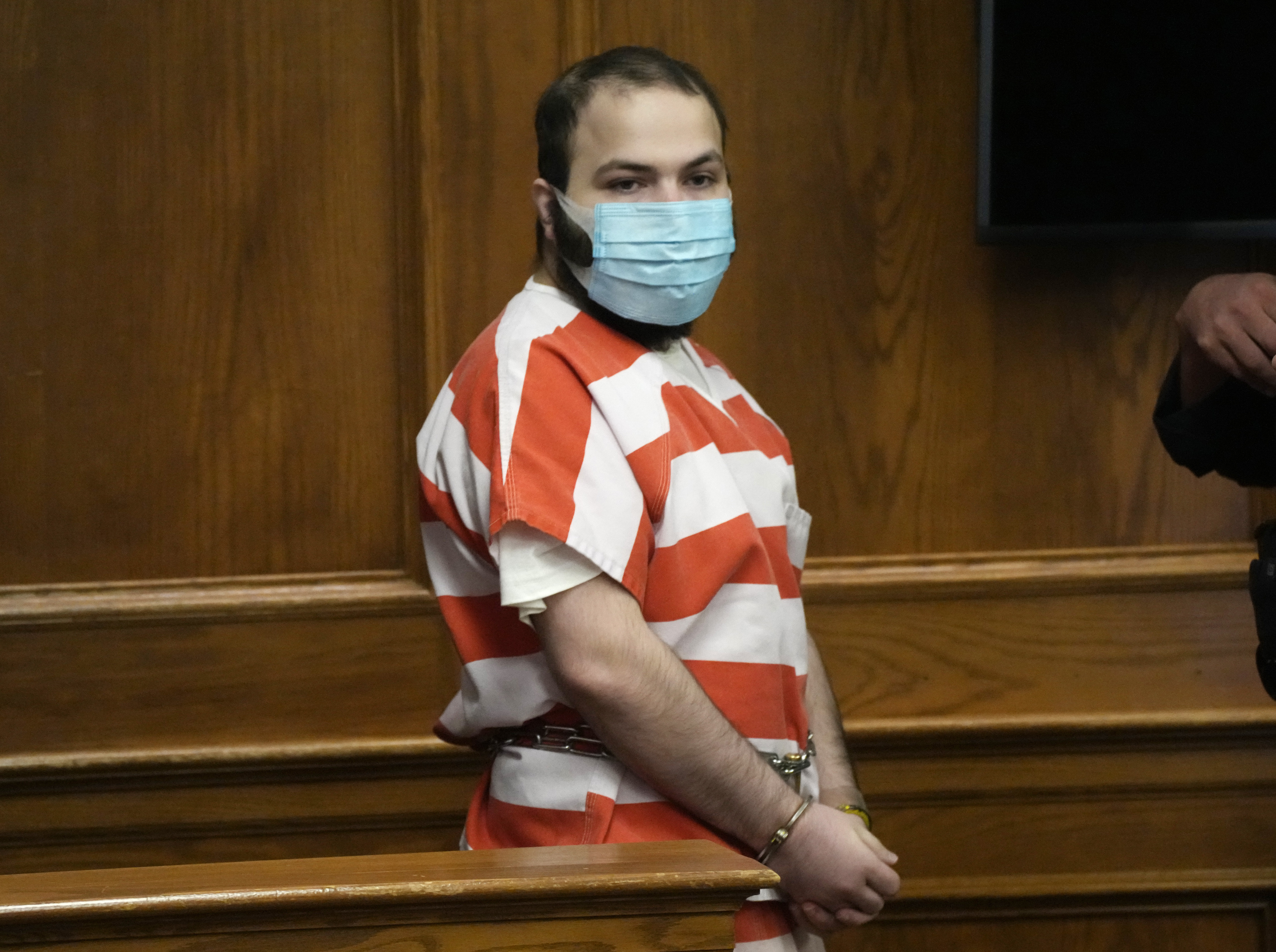 Ahmad Al Aliwi Alissa, accused of killing 10 people at a Colorado supermarket in March, is led into a courtroom for a hearing Tuesday, Sept. 7, 2021, in Boulder, Colo. A judge has ordered a state mental health evaluation for Alissa to determine if he is competent to stand trial. (AP Photo/David Zalubowski/Pool) (David Zalubowski)