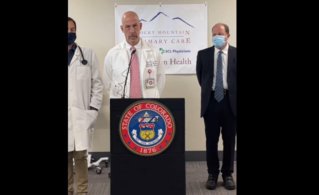 Dr. Aaron Shupp talks about the stress of caring for COVID patients, particularly when a vaccine is available to prevent or mitigate the disease. Photo courtesy Gov. Jared Polis' Facebook page.