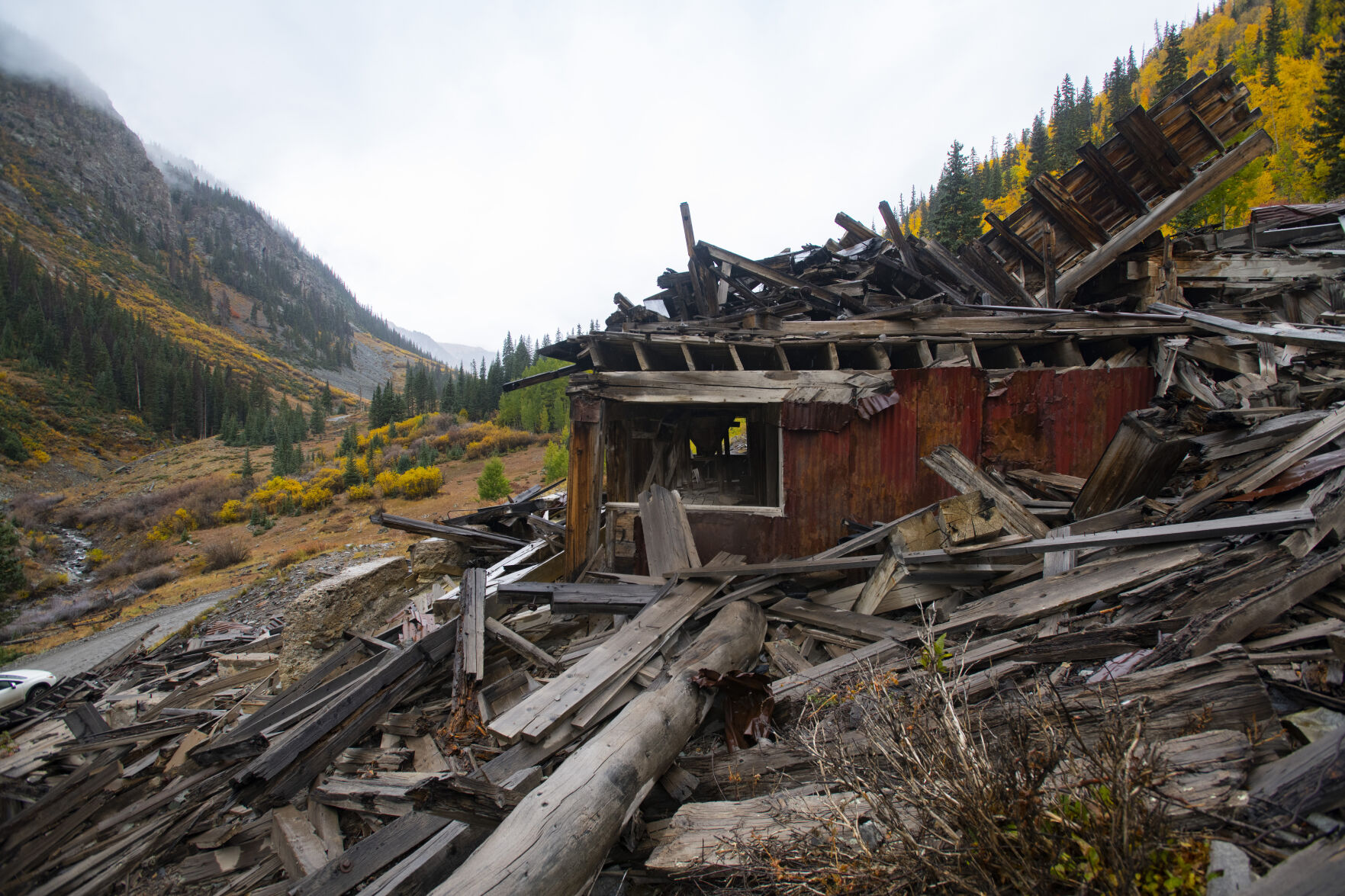 The fall foliage surrounds the remains of the Bonanza Empire Chief Mill Tuesday, Sept. 28, 2021. The historic structure was destroyed by an avalance in 2008. (The Gazette, Christian Murdock) (Christian Murdock/The Gazette)