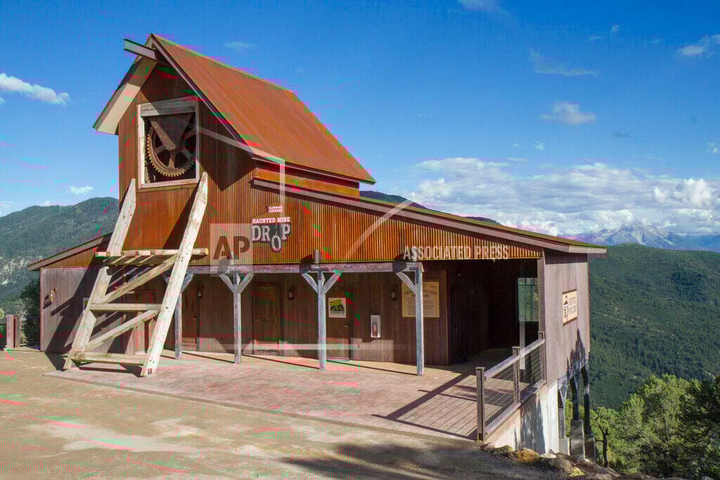 Colorado Springs girl killed on mine drop ride was not strapped in, report says